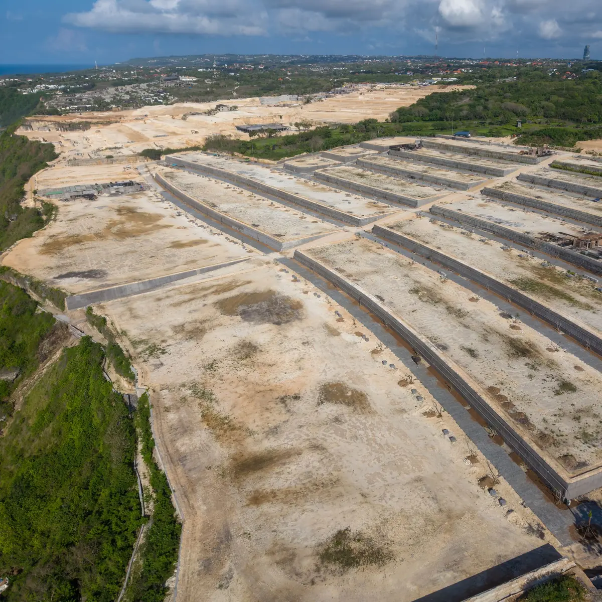 Aerial view of cleared land divided into building plots