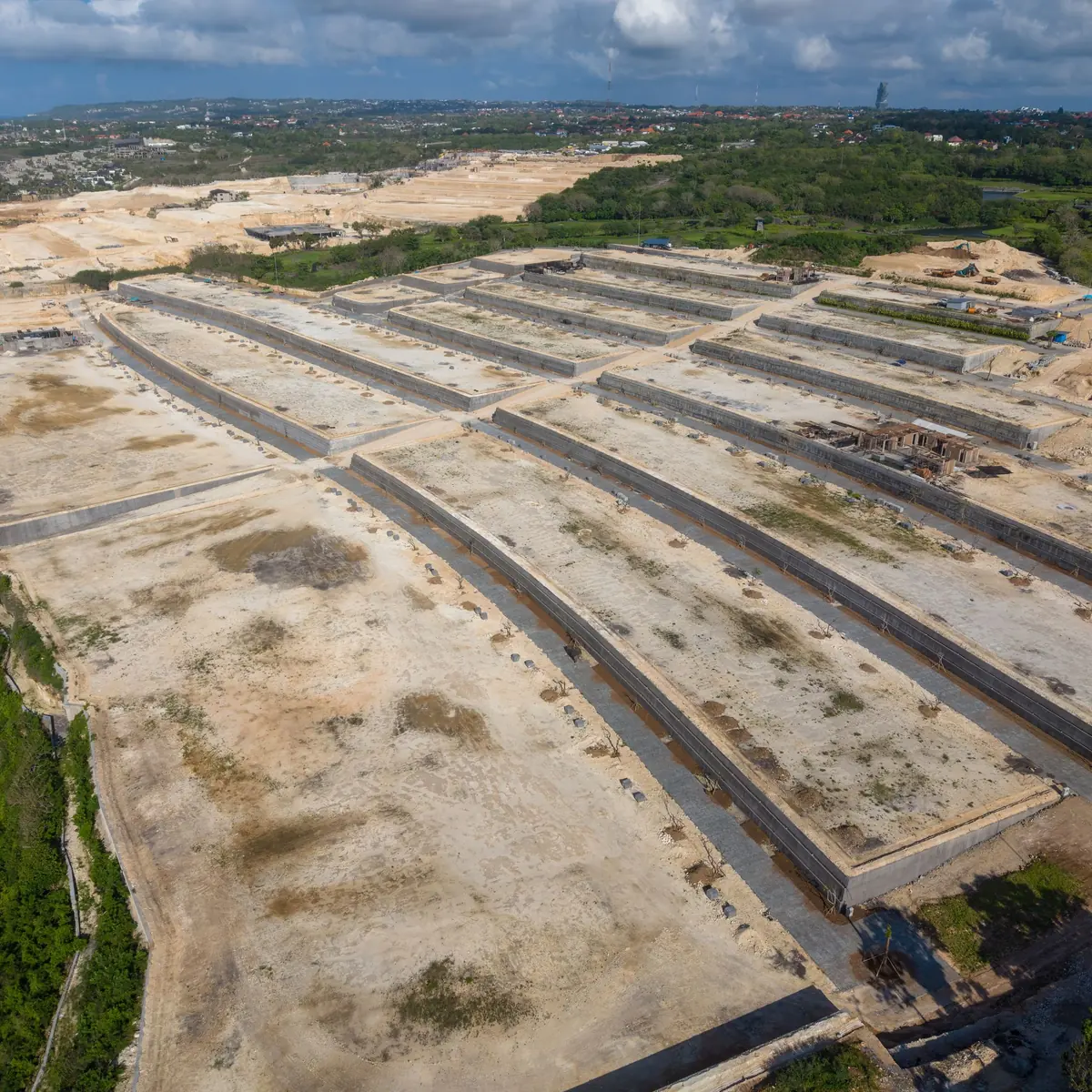 Aerial view of land divided into plots, ready for building